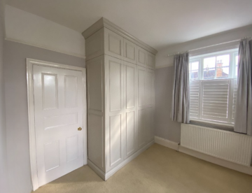 Bespoke floor to ceiling wardrobe in Lincoln by Radial Joinery