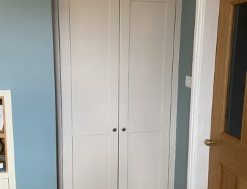 Bespoke alcove cupboard in Woodhall Spa with shaker style doors and fitted cornice
