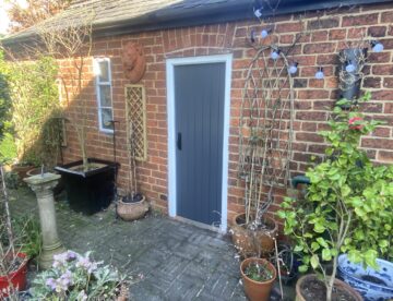Bespoke ledged and braced cottage door in Little Greene Vulcan