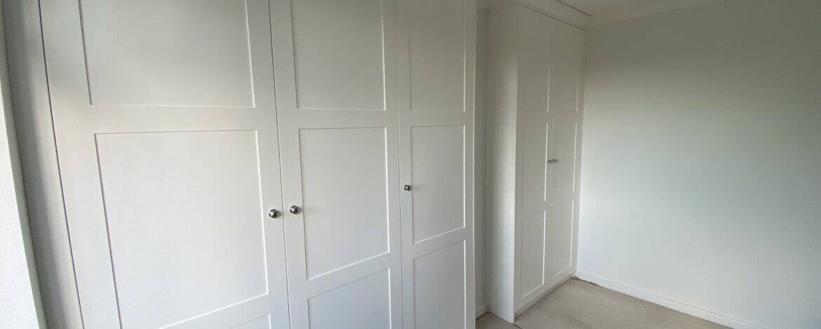 bespoke fitted wardrobes in Lincoln with shaker style doors by Radial Joinery