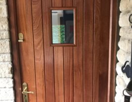 Handmade Sapele front door with glazed panel installed in Lincoln