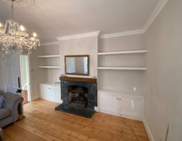 Bespoke alcove storage with shaker doors and soft close hinges