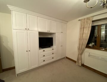 Bespoke fitted bedroom wardrobe with TV space in Waddingham