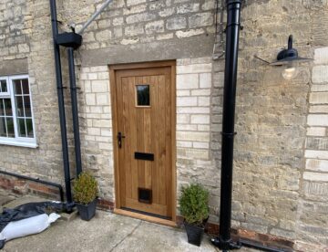 Bespoke cottage style oak front door in Digby Lincoln with vision panel