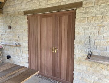 External view of bespoke boarded Sapele double doors with matching side panel in Lincolnshire.