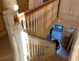 Victorian staircase with replacement wall panelling and handrail work in Lincoln property.
